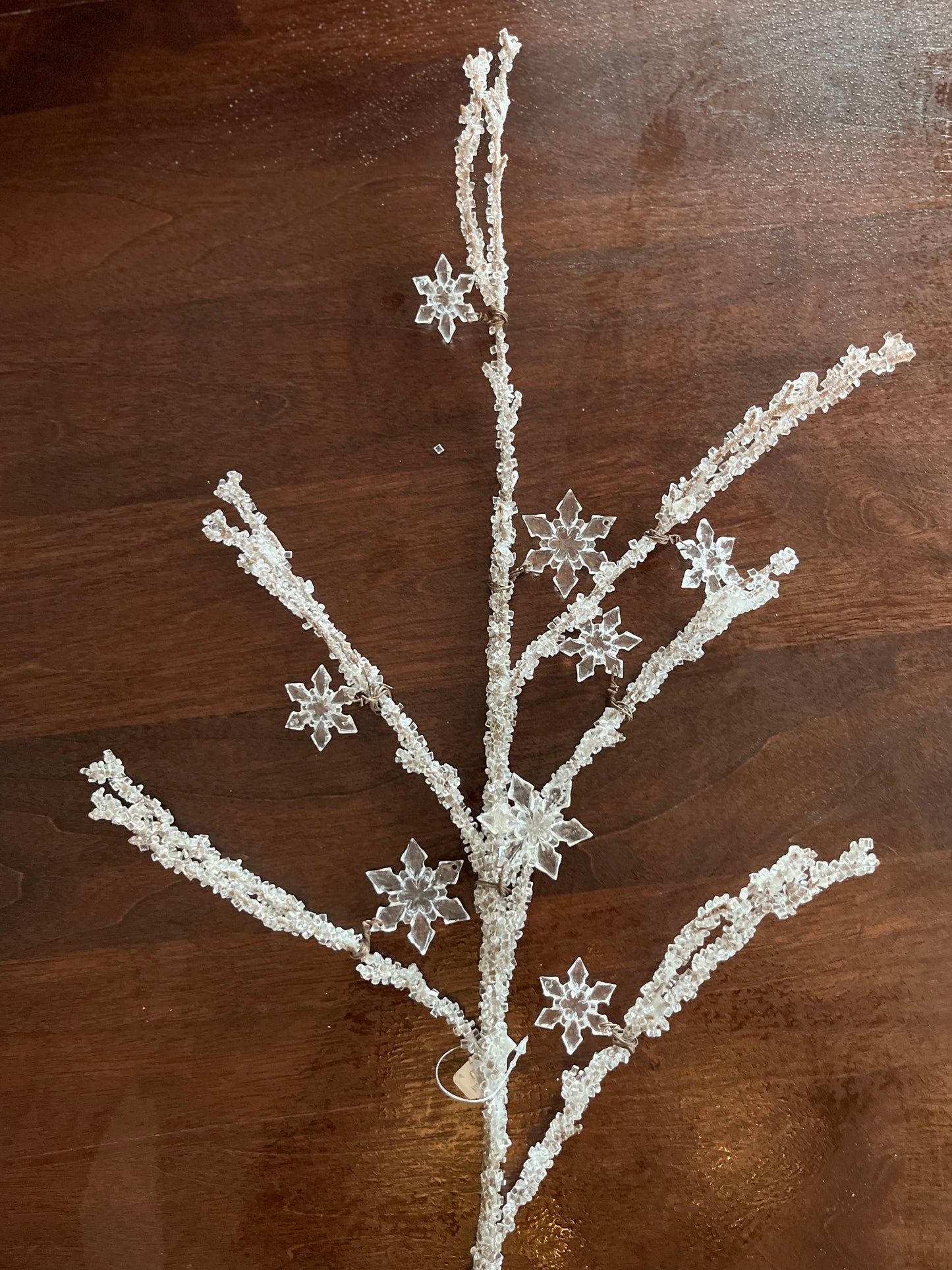 Icy Branch with Snowflakes
